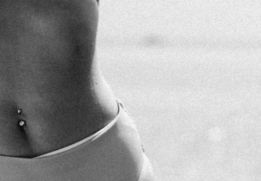 a-black-and-white-photo-of-a-woman-in-a-bikini.jpg a black and white photo of a woman in a bikini