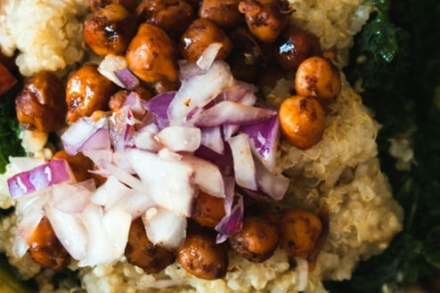 a-blue-bowl-filled-with-vegetables-and-rice.jpg a blue bowl filled with vegetables and rice